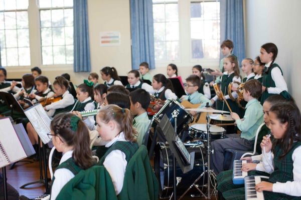 St Francis Xavier Catholic Primary School Ashbury - students playing musical instruments